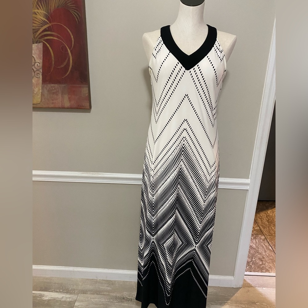 Chico’s Black and White V neck sleeveless dress lined to knee